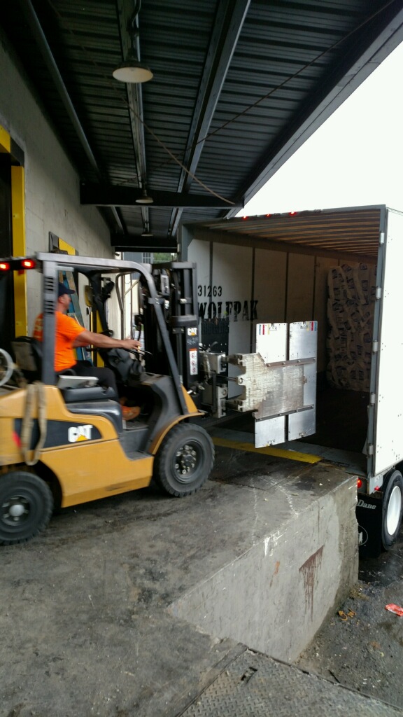 forklift loading wolfpak transport trailer
